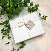 Un coffret cadeaux "Mon Bureau 100% Responsable", livré dans son emballage cadeau en carton recyclé