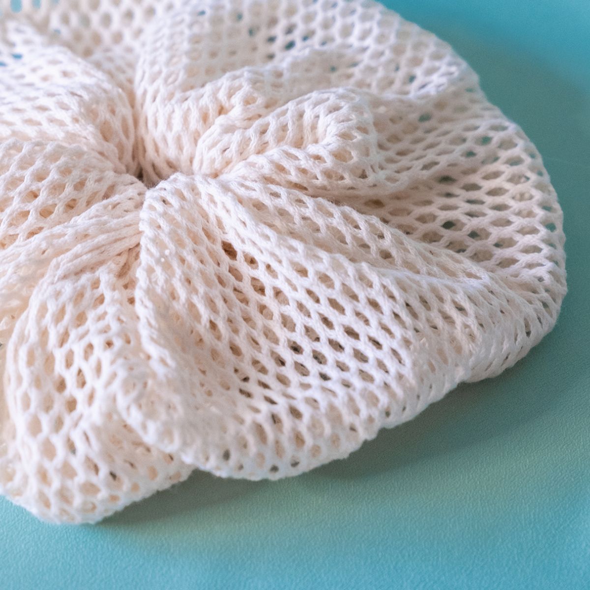 fleur de couche moussante et exfoliante coton bio gots des demain vue detail